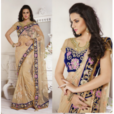 Tremendous Beige Colored Embroidered Net Saree